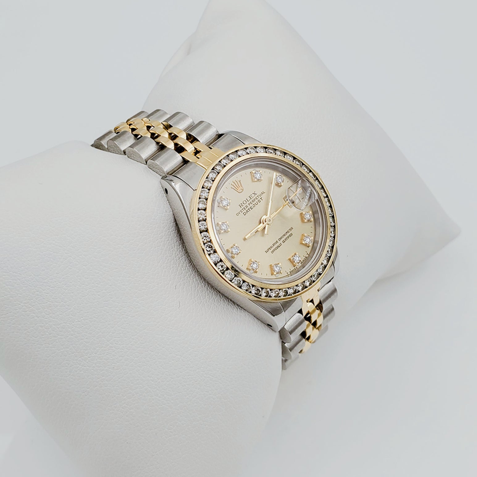 Ladies Rolex 26mm DateJust 18K Gold / Two Tone Stainless Steel Watch with Champagne Diamond Dial and Diamond Bezel. (Pre-Owned)