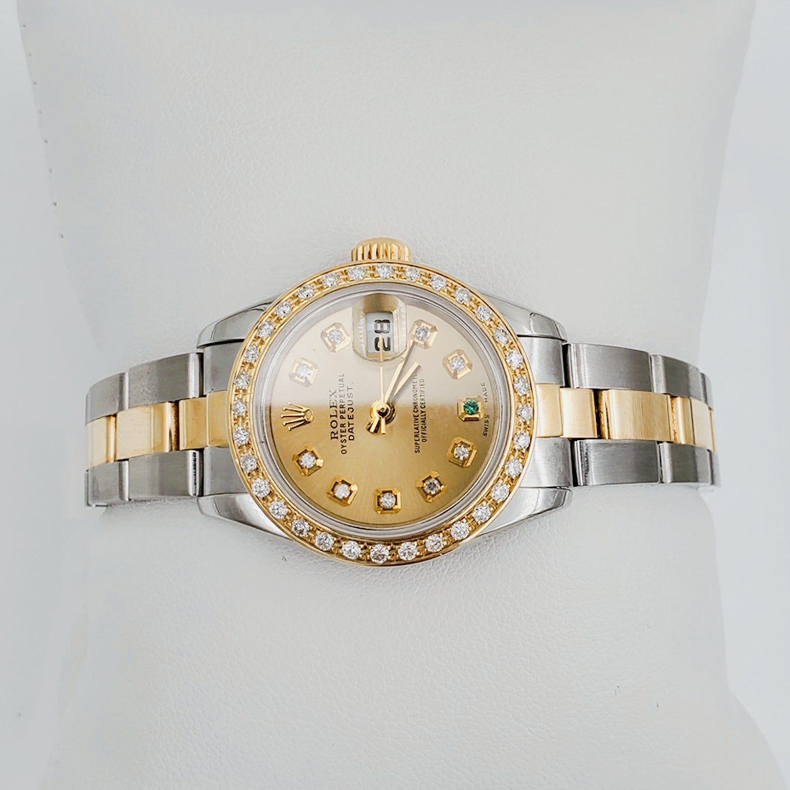 Ladies Rolex 26mm DateJust 18K Gold / Two Tone Watch with Champagne Diamond / Emerald Dial and Custom Diamond Bezel. (Pre-Owned)