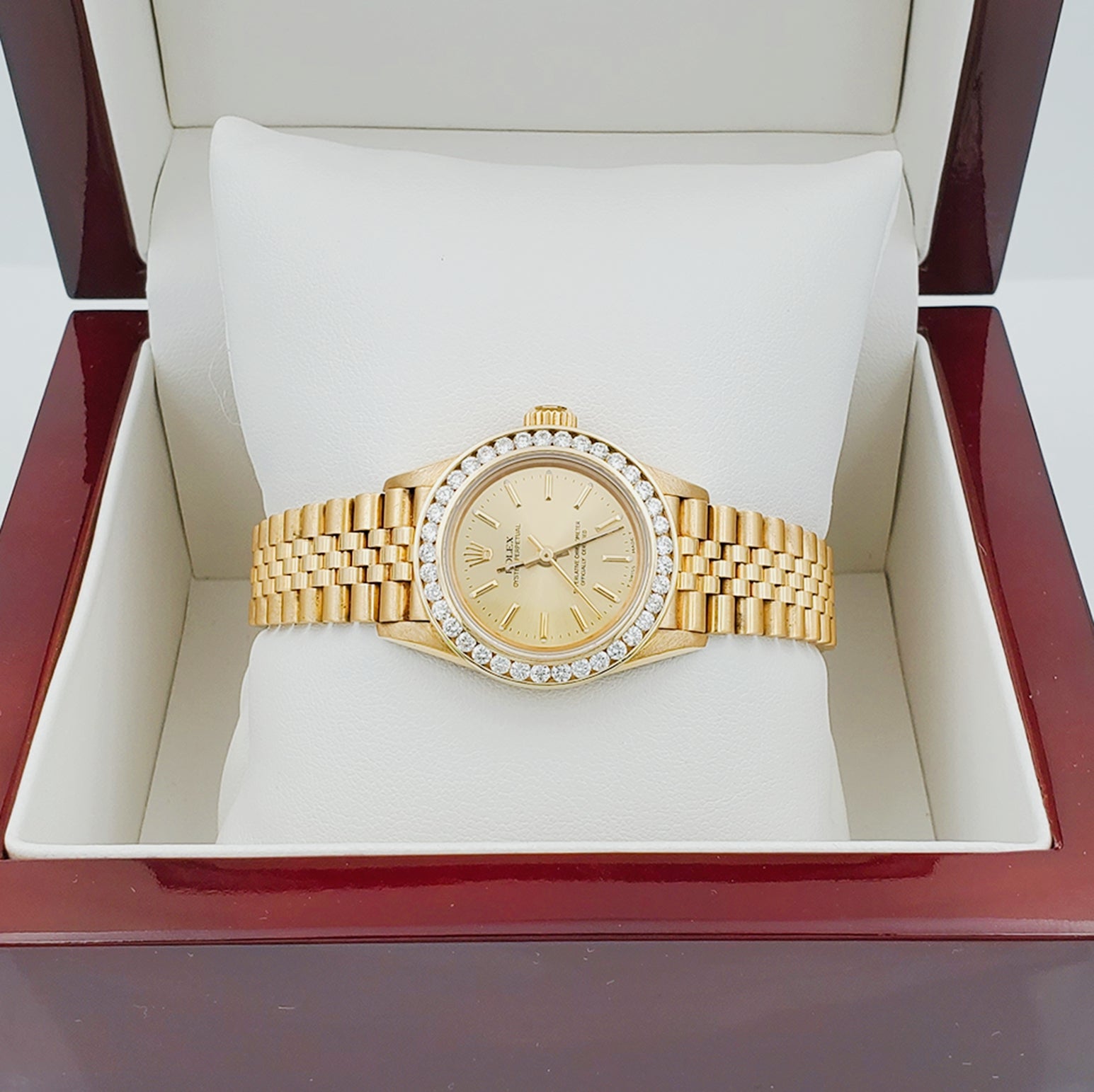 Ladies Rolex 26mm DateJust 18K Solid Yellow Gold Watch with Champagne Dial and Custom Diamond Bezel. (Pre-Owned)