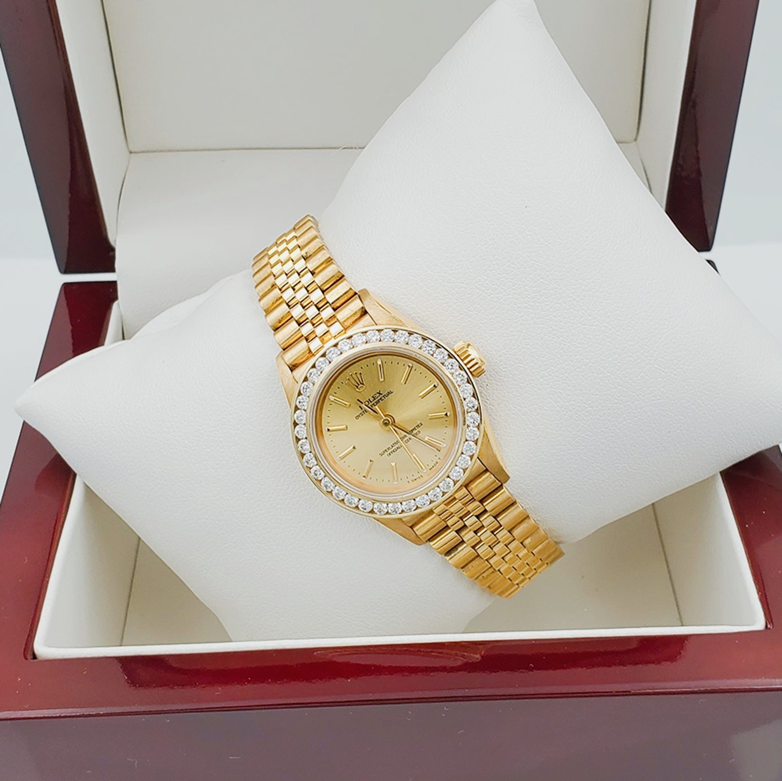 Ladies Rolex 26mm DateJust 18K Solid Yellow Gold Watch with Champagne Dial and Custom Diamond Bezel. (Pre-Owned)