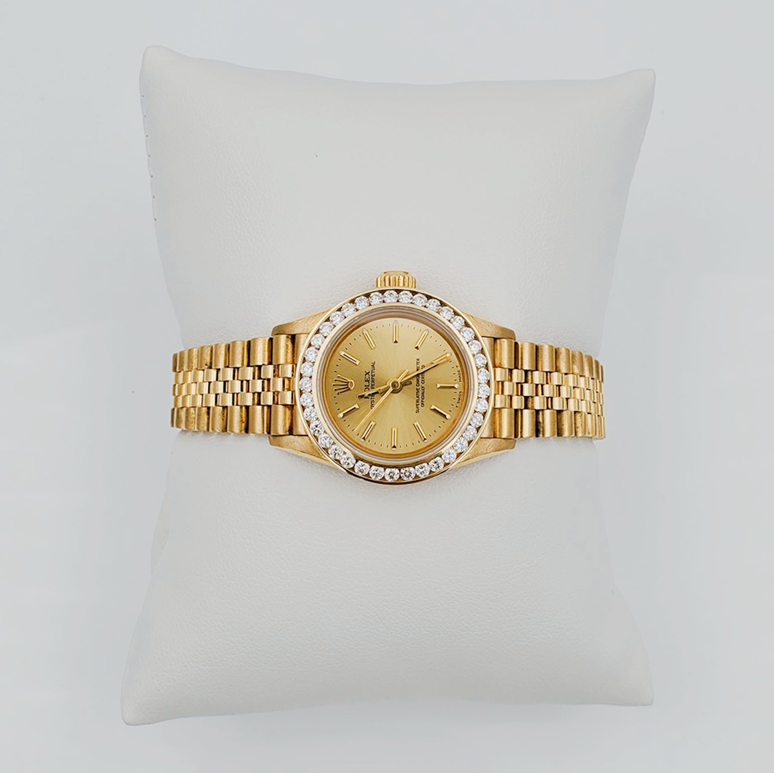 Ladies Rolex 26mm DateJust 18K Solid Yellow Gold Watch with Champagne Dial and Custom Diamond Bezel. (Pre-Owned)