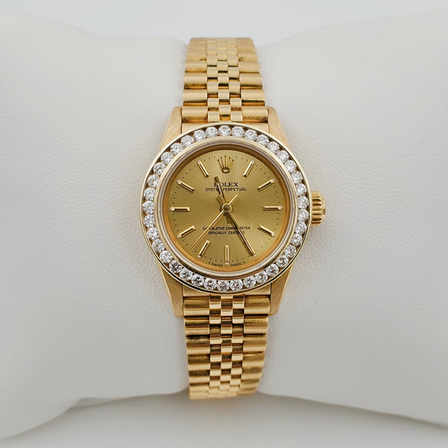 Ladies Rolex 26mm DateJust 18K Solid Yellow Gold Watch with Champagne Dial and Custom Diamond Bezel. (Pre-Owned)