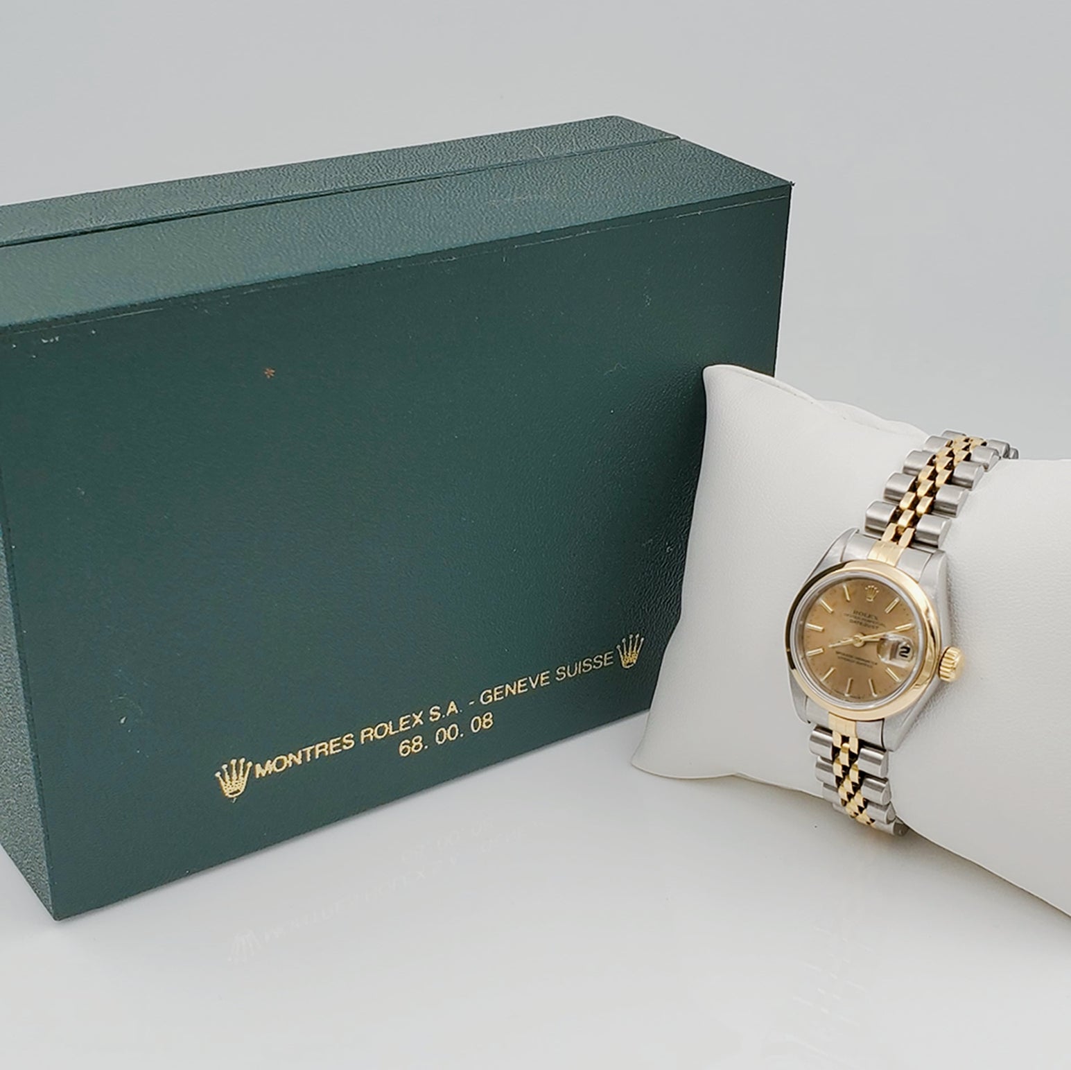 Ladies Rolex 26mm DateJust Two Tone 18K Gold Watch with Champagne Dial and Smooth Bezel. (Pre-Owned)