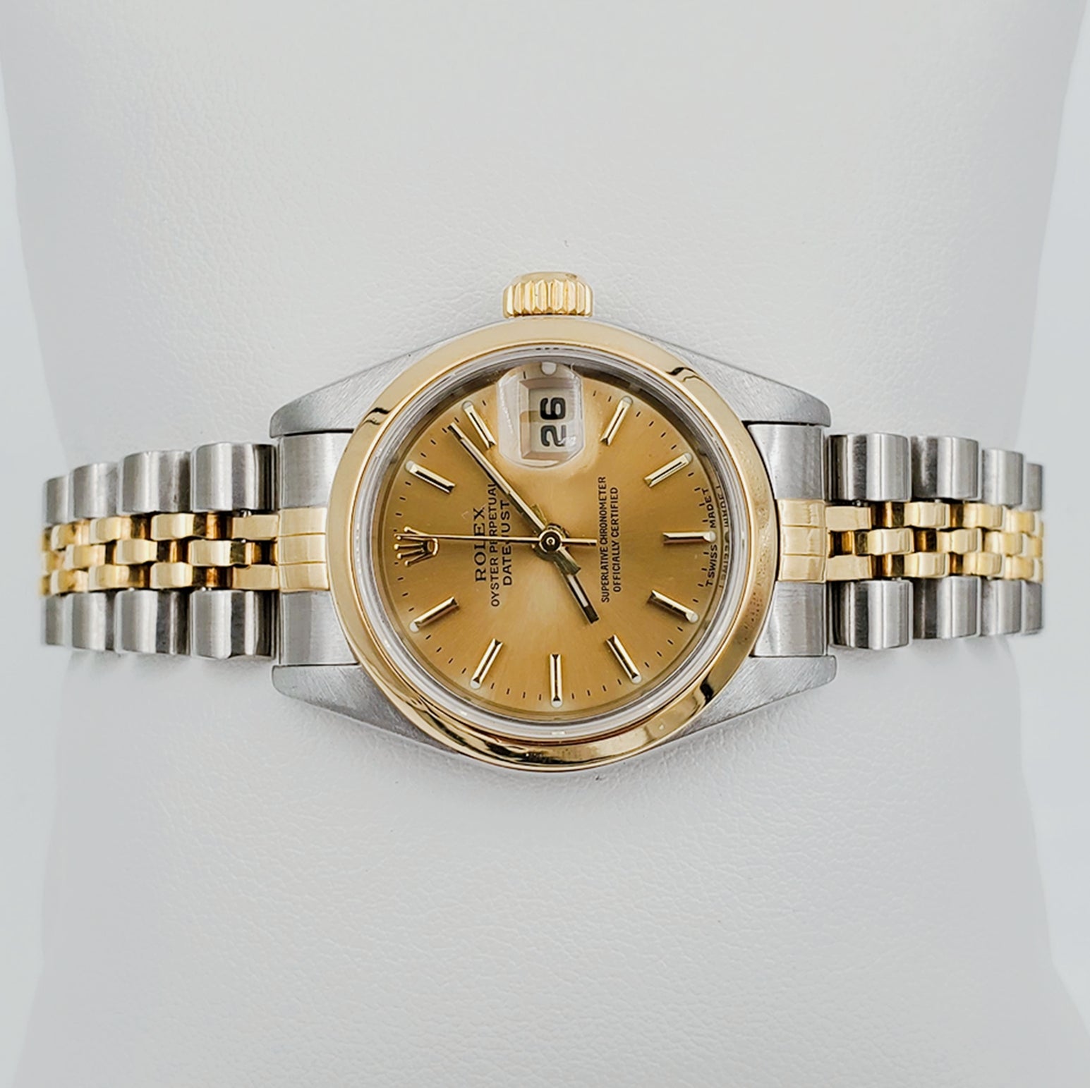 Ladies Rolex 26mm DateJust Two Tone 18K Gold Watch with Champagne Dial and Smooth Bezel. (Pre-Owned)