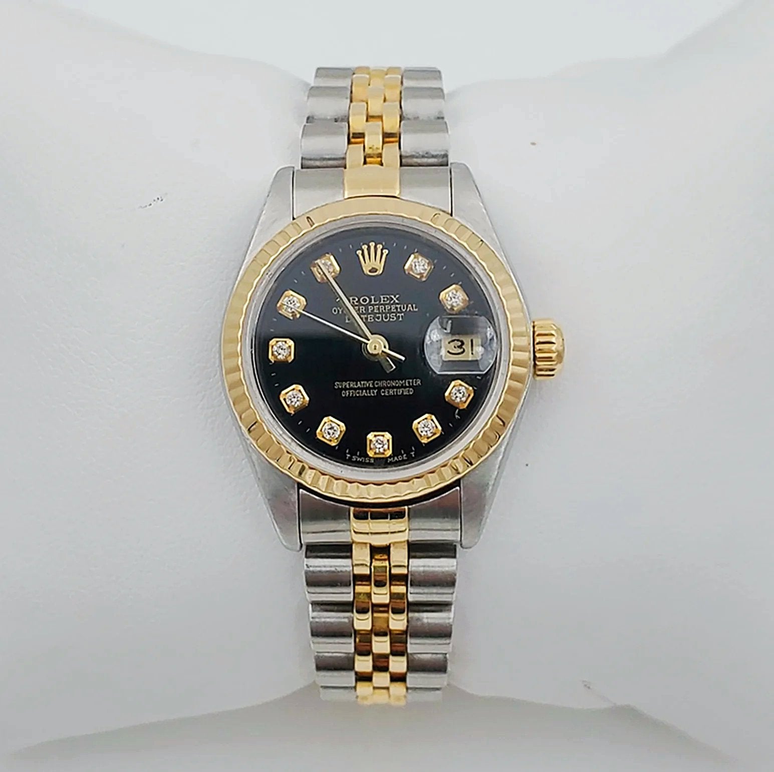 Ladies Rolex 26mm DateJust Two Tone 18K Yellow Gold / Stainless Steel Watch with Black Diamond Dial and Fluted Bezel. (Pre-Owned)