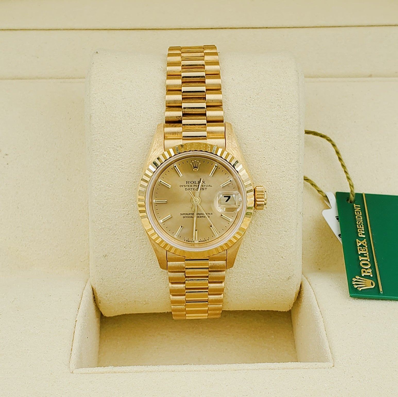 Ladies Rolex 26mm Presidential 18K Solid Yellow Gold Watch with Champagne Dial and Fluted Bezel. (NEW 69178)