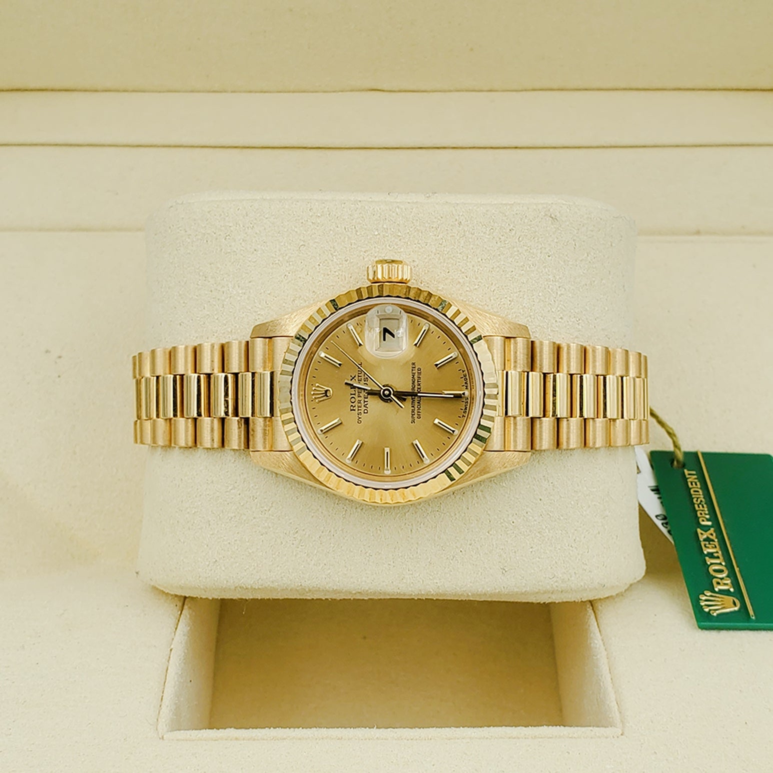 Ladies Rolex 26mm Presidential 18K Solid Yellow Gold Watch with Champagne Dial and Fluted Bezel. (NEW 69178)