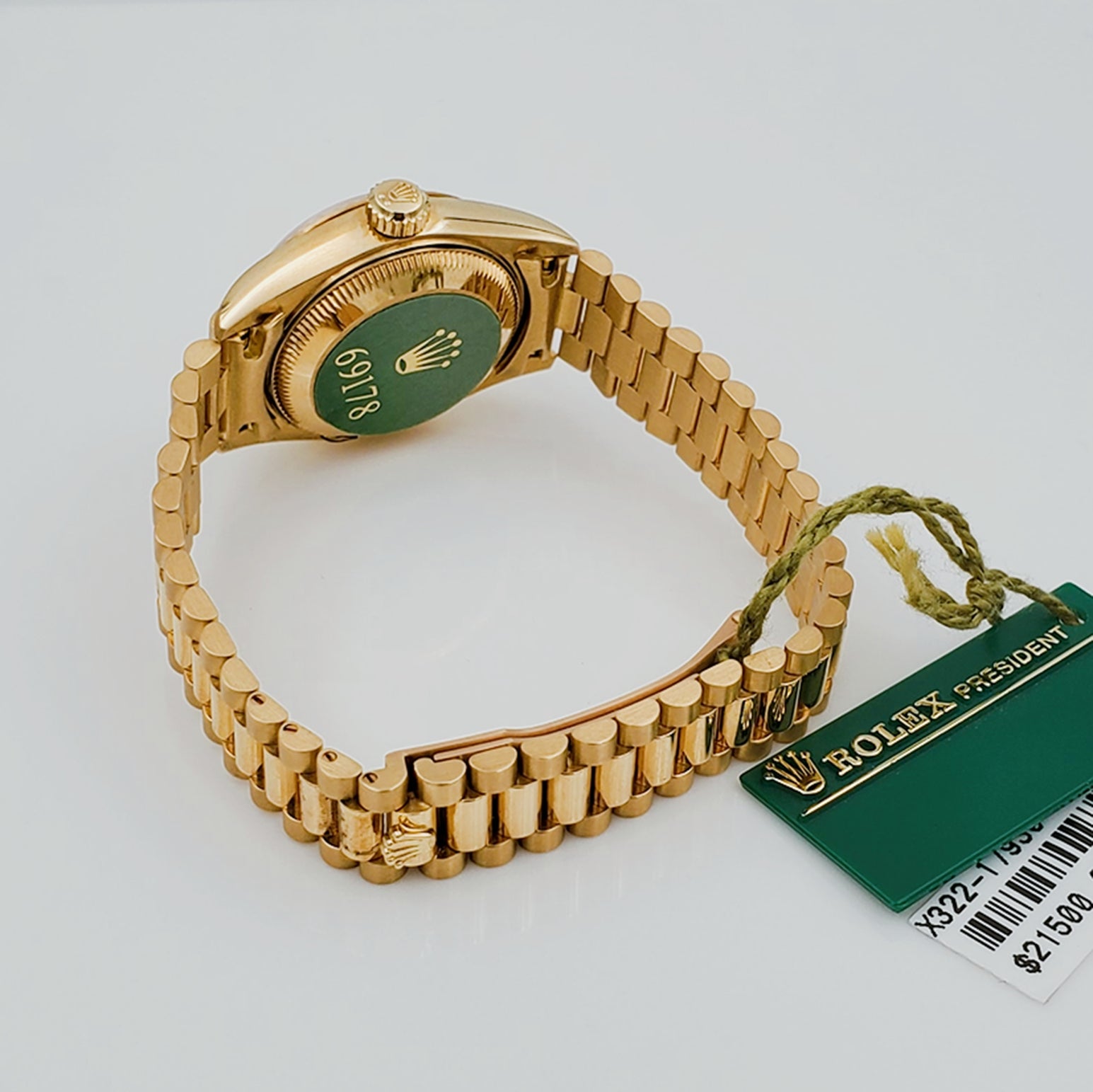 Ladies Rolex 26mm Presidential 18K Solid Yellow Gold Watch with Champagne Dial and Fluted Bezel. (NEW 69178)