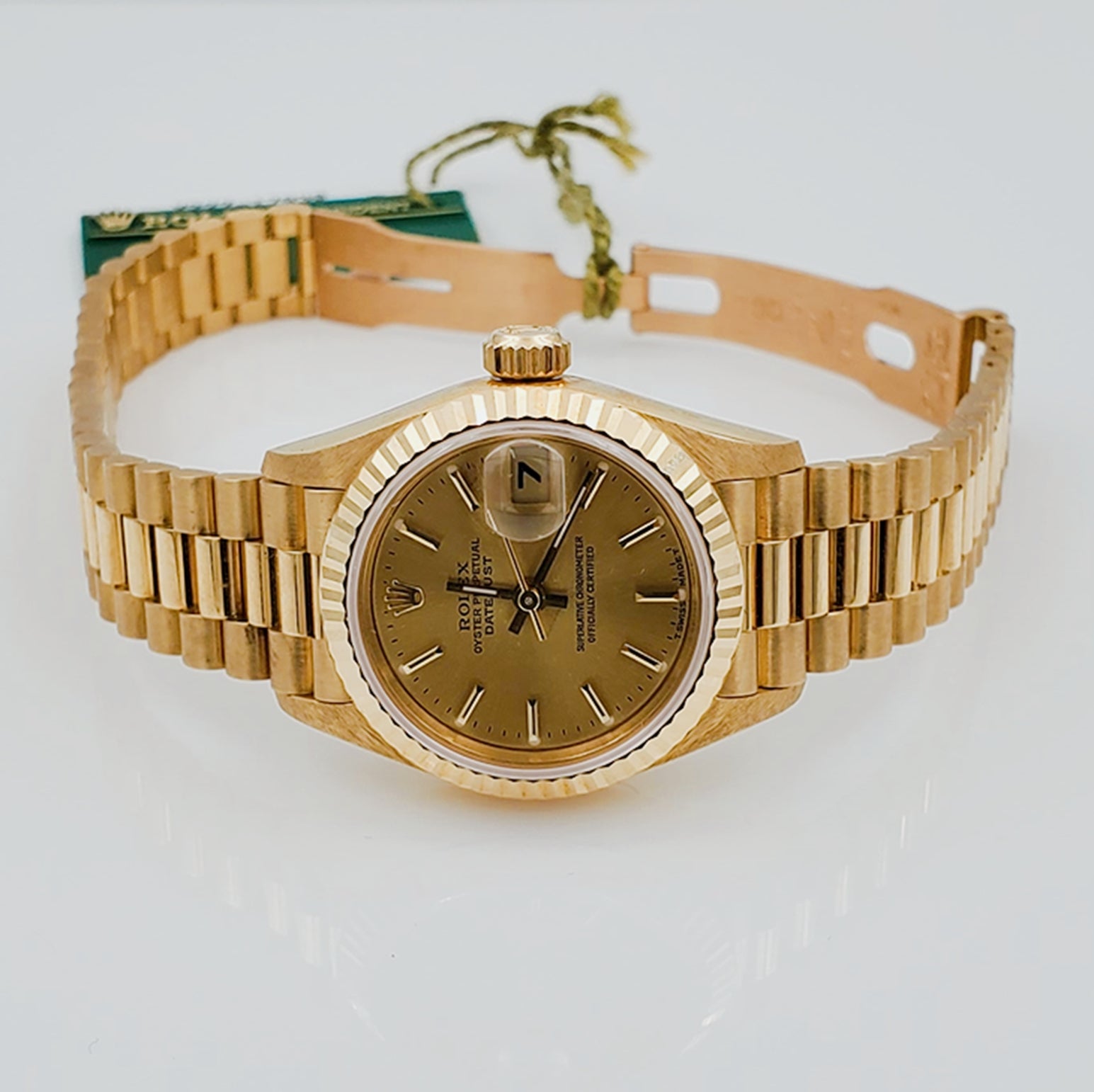 Ladies Rolex 26mm Presidential 18K Solid Yellow Gold Watch with Champagne Dial and Fluted Bezel. (NEW 69178)