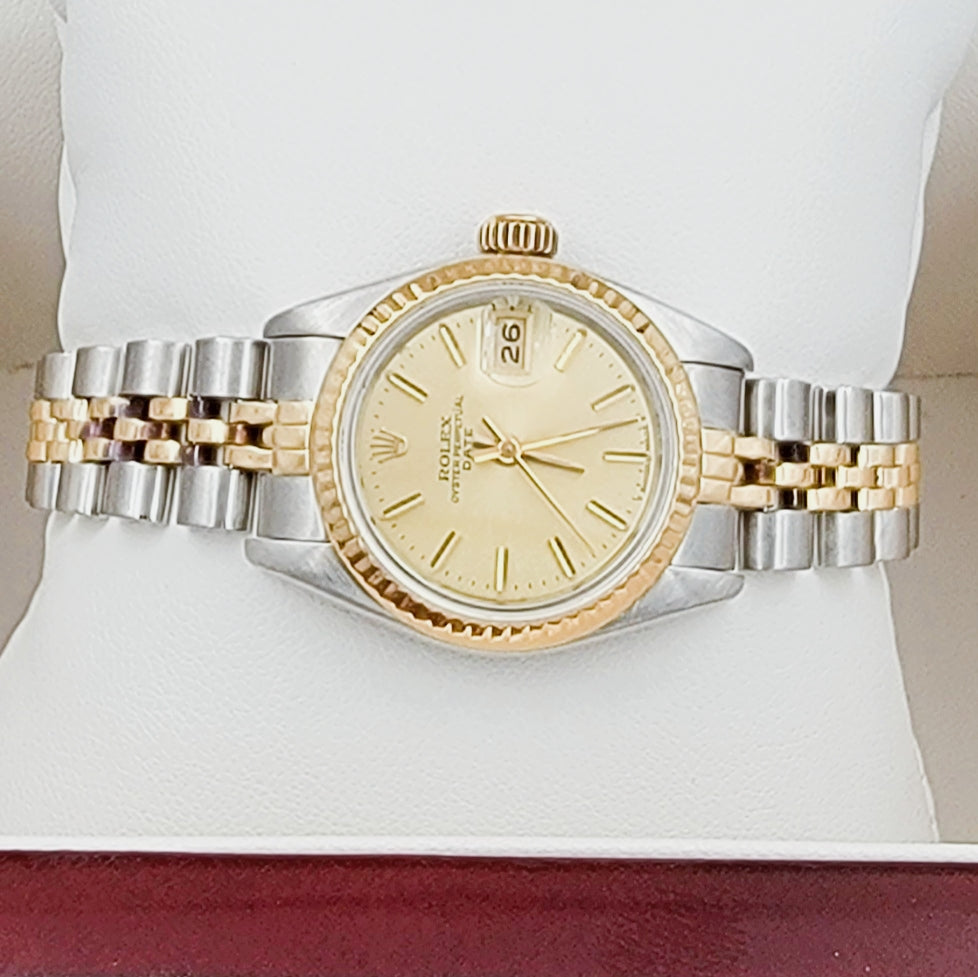 Ladies Rolex 26mm Date Two Tone 18K Yellow Gold / Stainless Steel Watch with Champagne Dial and Fluted Bezel. (Pre-Owned)