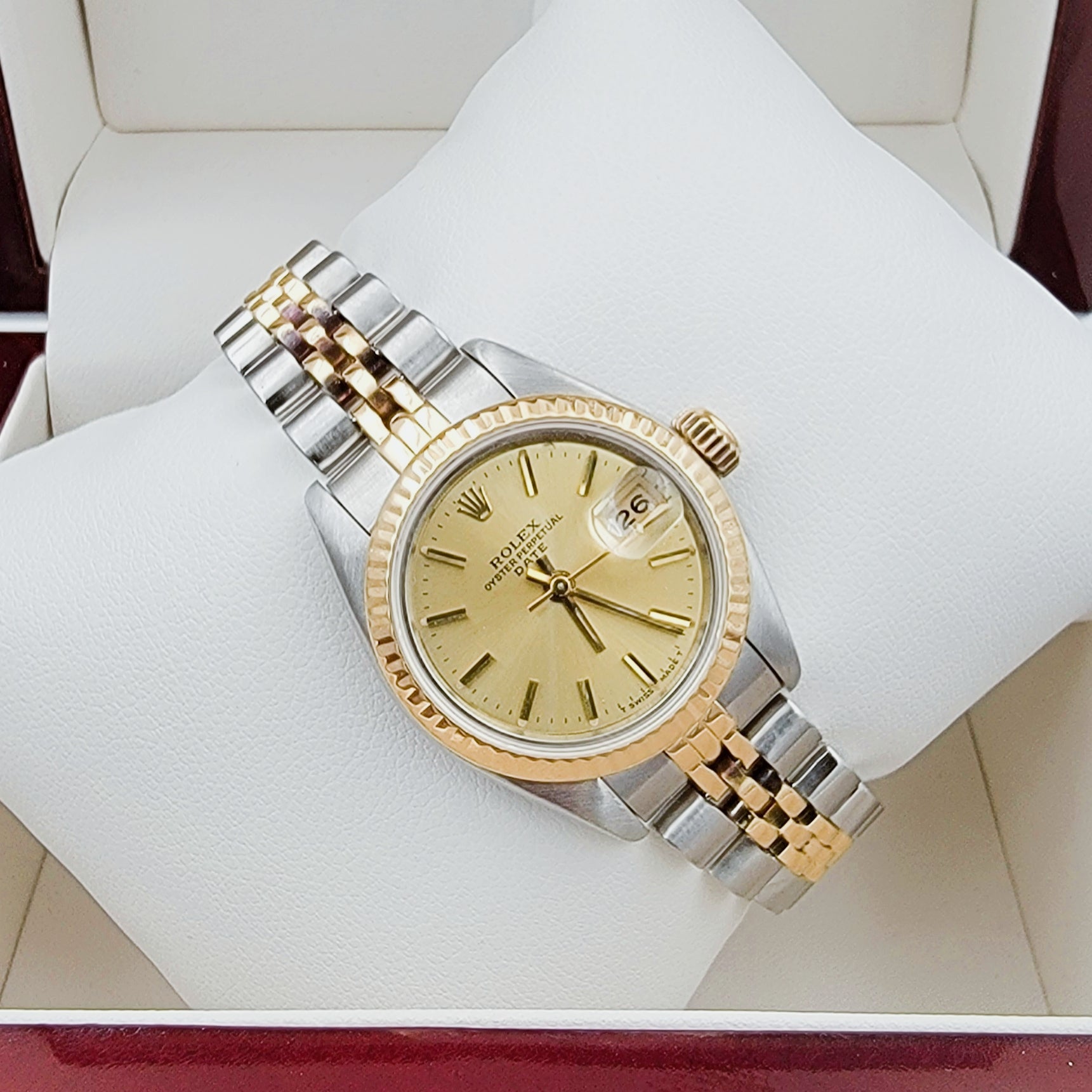 Ladies Rolex 26mm Date Two Tone 18K Yellow Gold / Stainless Steel Watch with Champagne Dial and Fluted Bezel. (Pre-Owned)