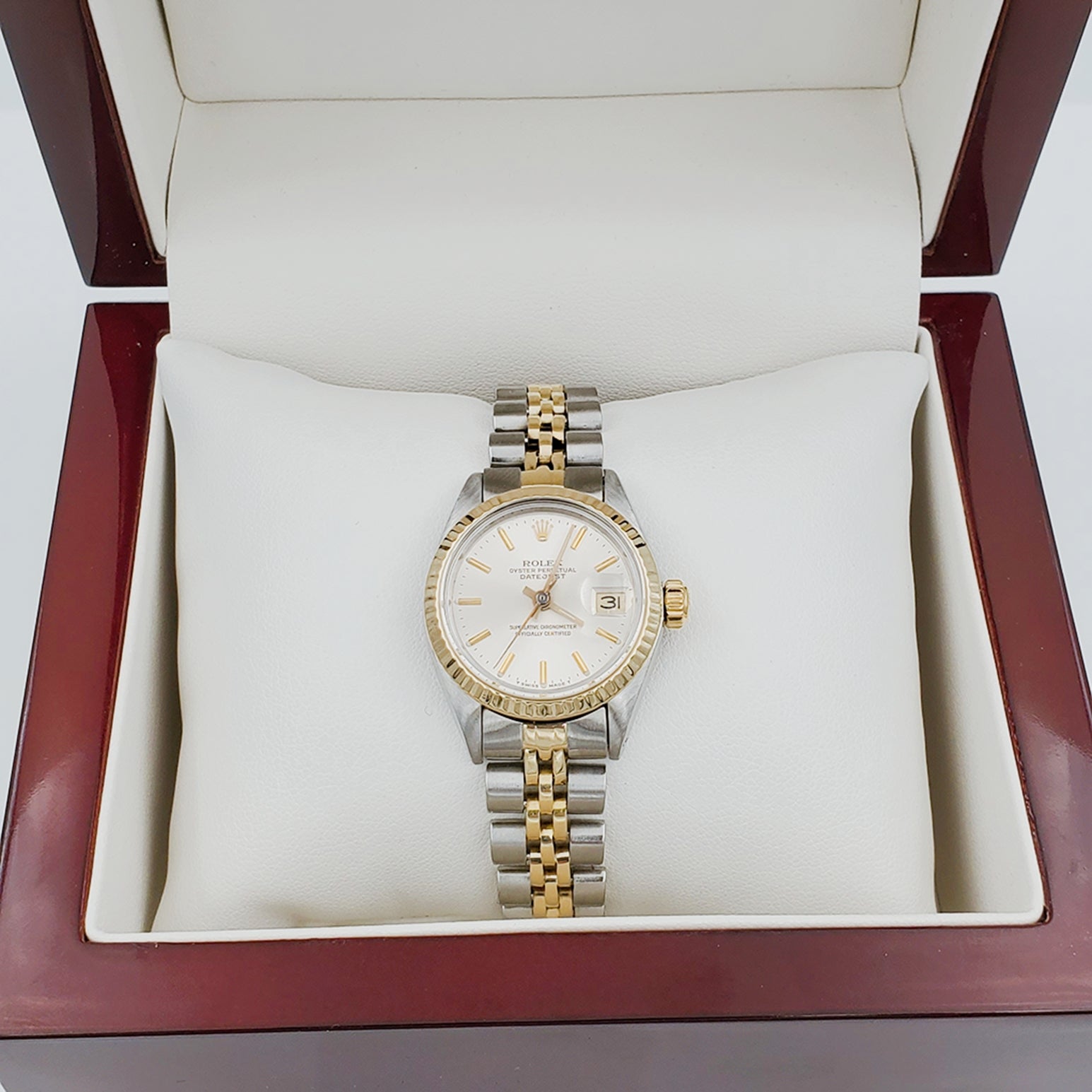 Ladies Rolex 26mm DateJust Two Tone 14K Yellow Gold / Stainless Steel Watch with Silver Dial and 14k Fluted Bezel. (Pre-Owned)