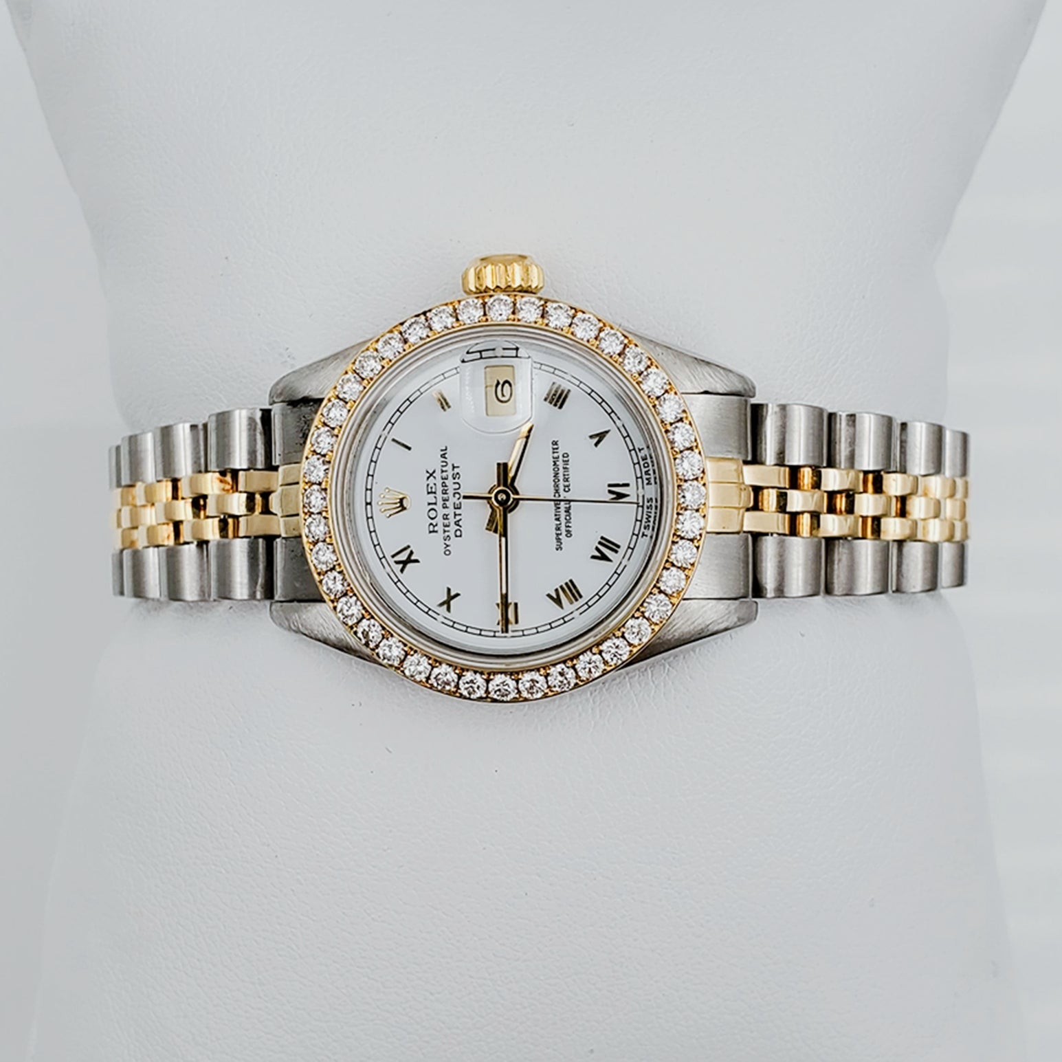 Ladies Rolex 26mm DateJust 18K Gold Two Tone Watch with White Dial, Roman Numerals and Diamond Bezel. (Pre-Owned)