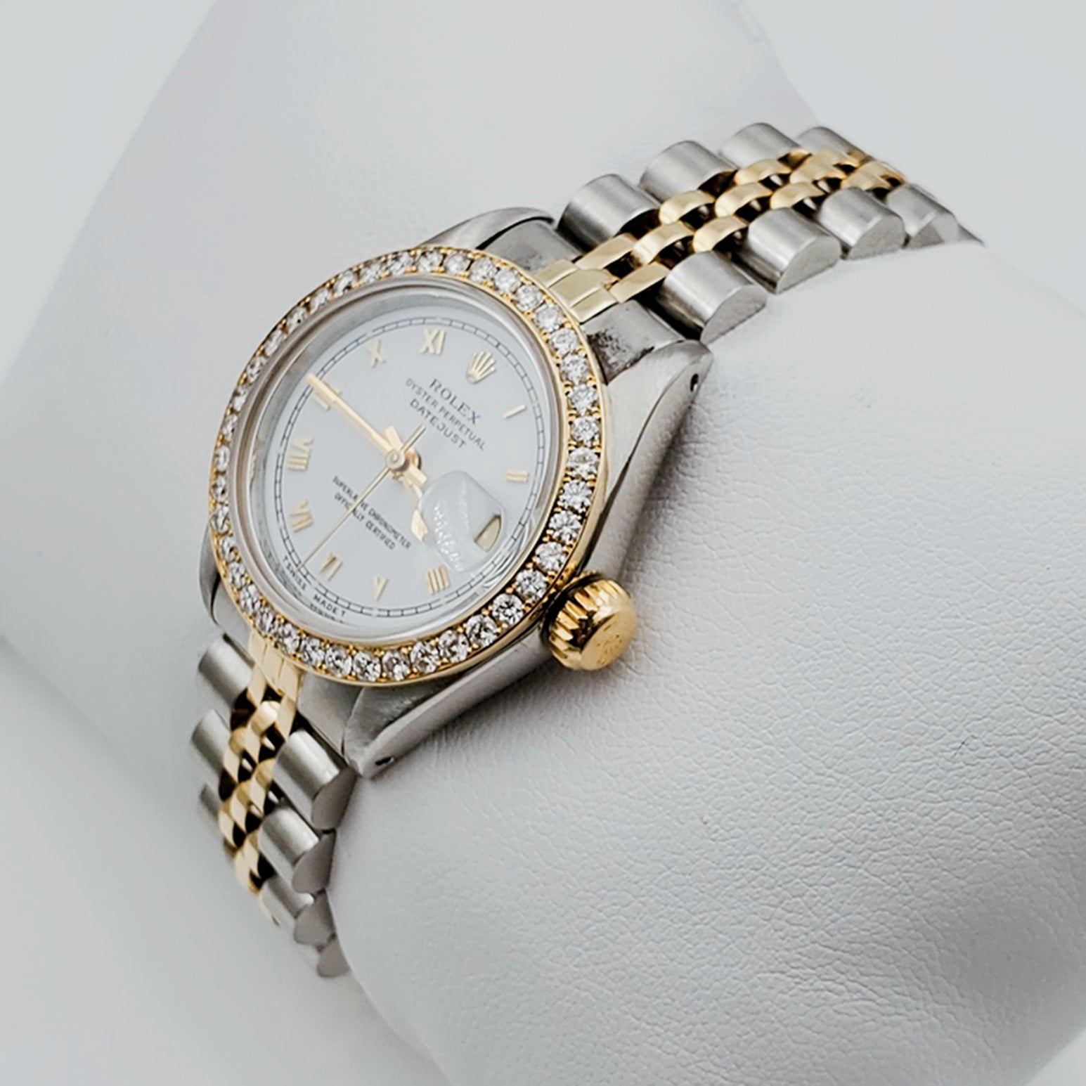 Women's Rolex 26mm DateJust 18K Gold Two-Tone Watch with White Dial, Roman Numerals and Diamond Bezel. (Pre-Owned)