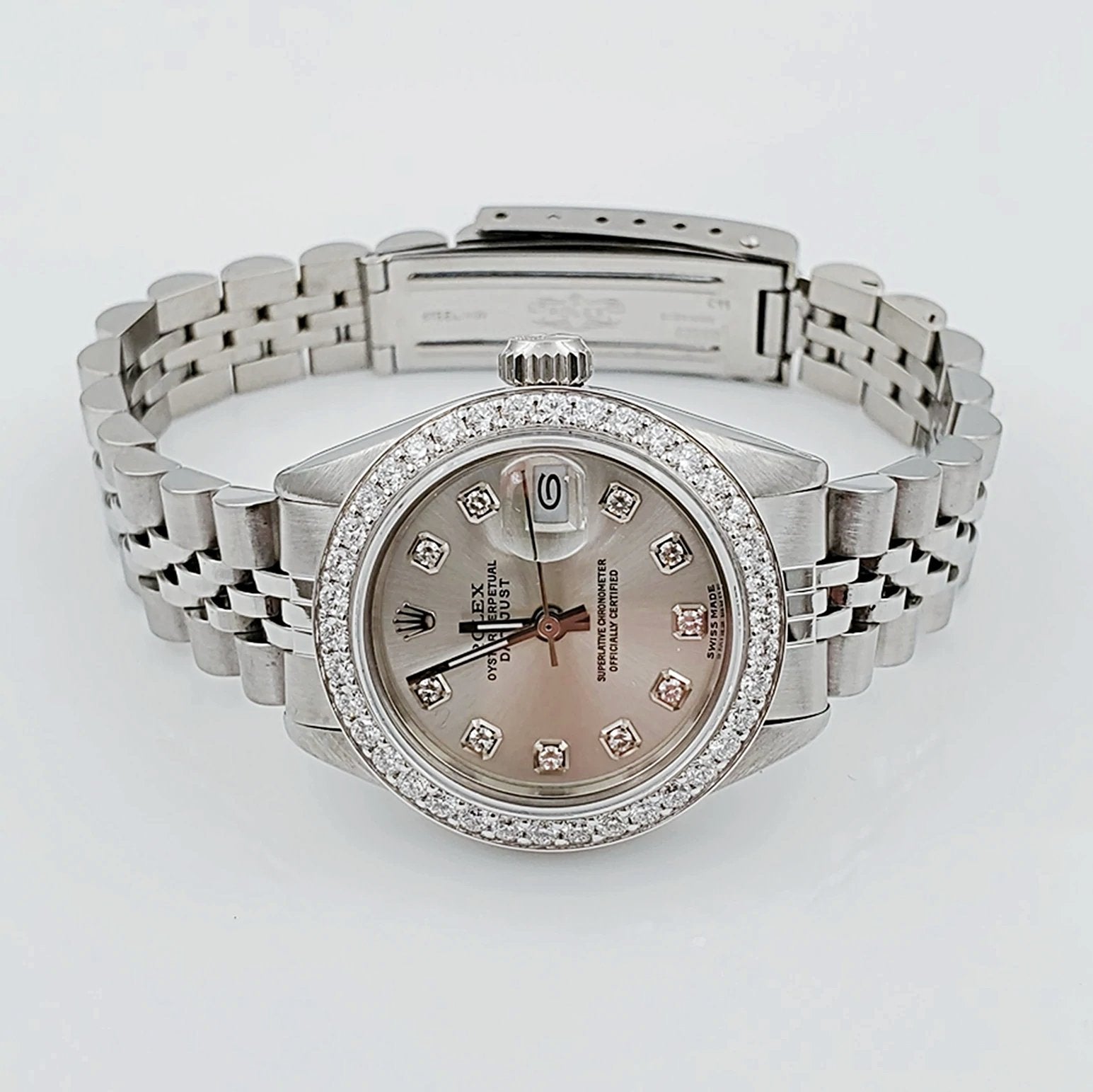 Ladies Rolex 26mm DateJust Stainless Steel Watch with Silver Diamond Dial and Diamond Bezel. (Pre-Owned 69174)