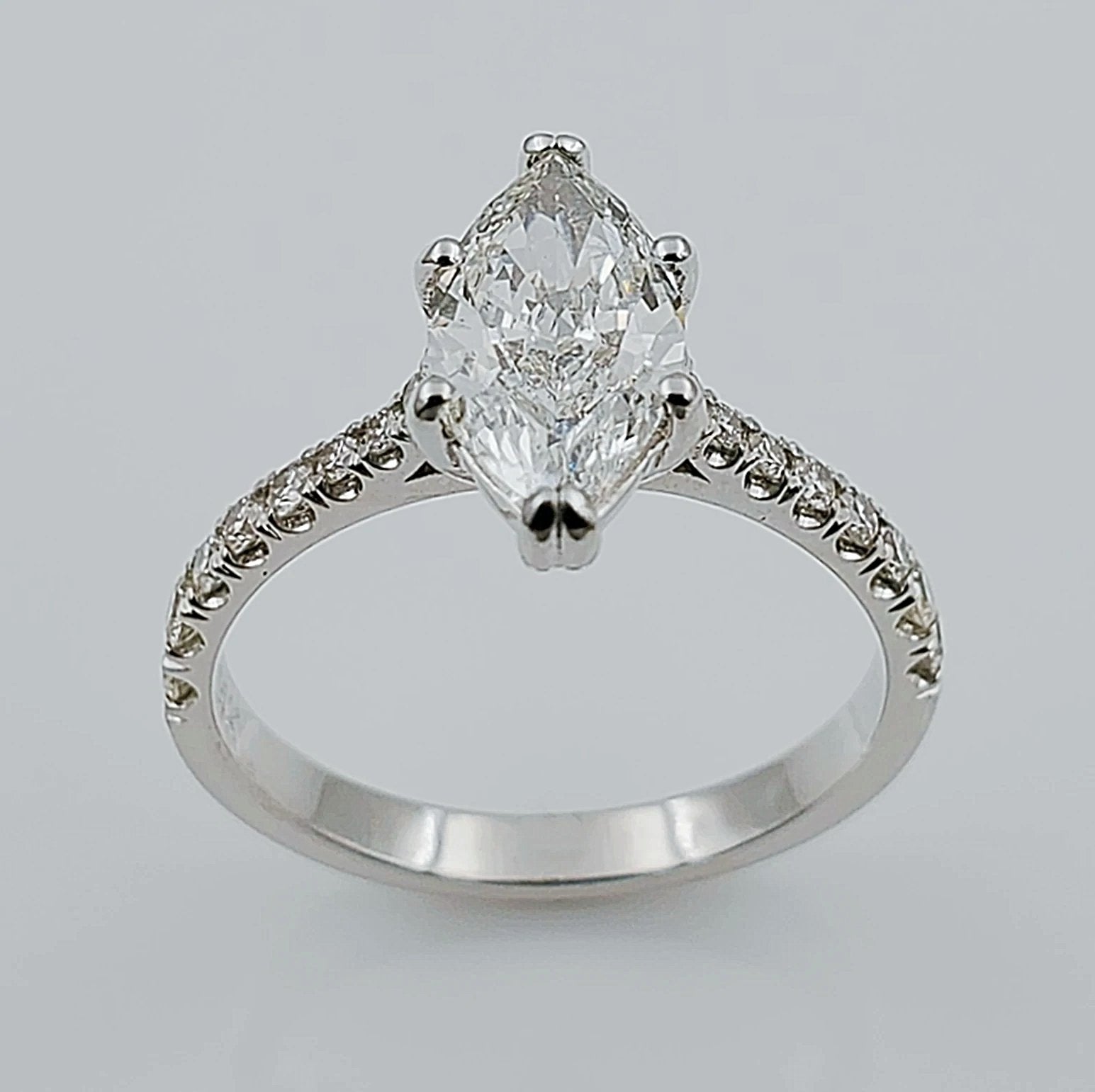 Women's 14K White Gold with 1.12 CT Marquis Center Diamond (I1 Color I) 2.9 GR Total Weight Wedding Ring. (Size: 6.25)