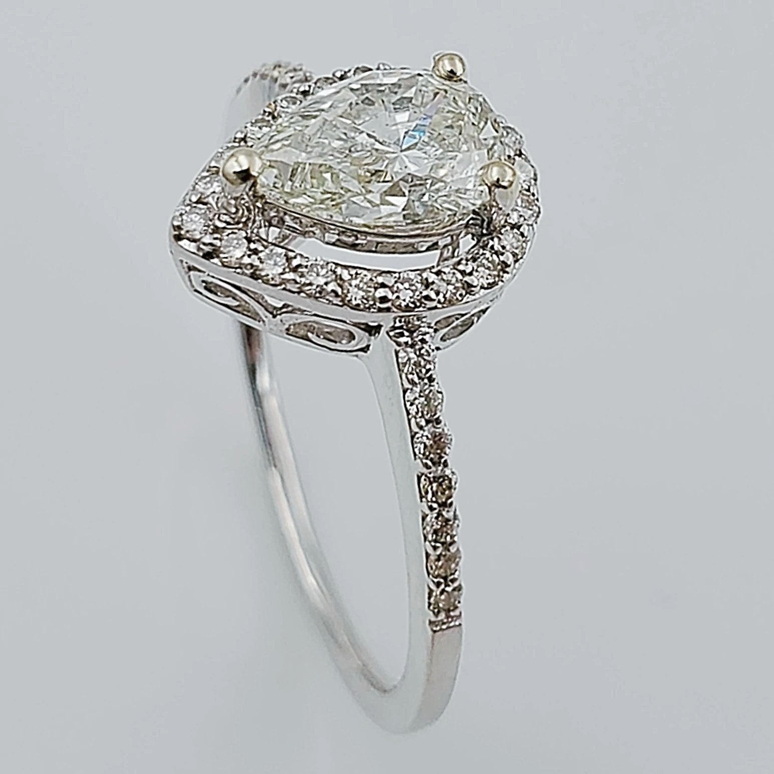 Women's 14K White Gold 35 Round Diamonds and 0.69 CT Pear Shape Center Stone (I1 Color J) 2.8 GR Anniversary Band. (Size: 6.25)