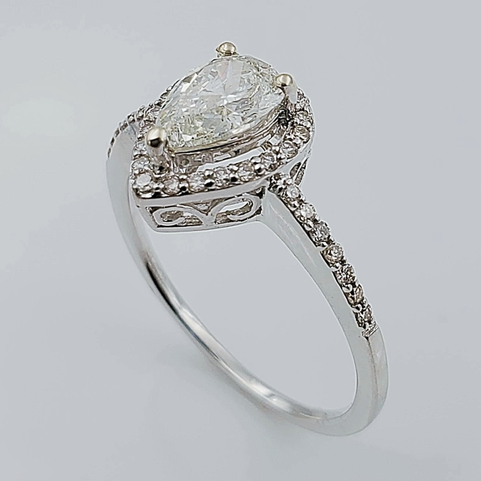 Women's 14K White Gold 35 Round Diamonds and 0.69 CT Pear Shape Center Stone (I1 Color J) 2.8 GR Anniversary Band. (Size: 6.25)