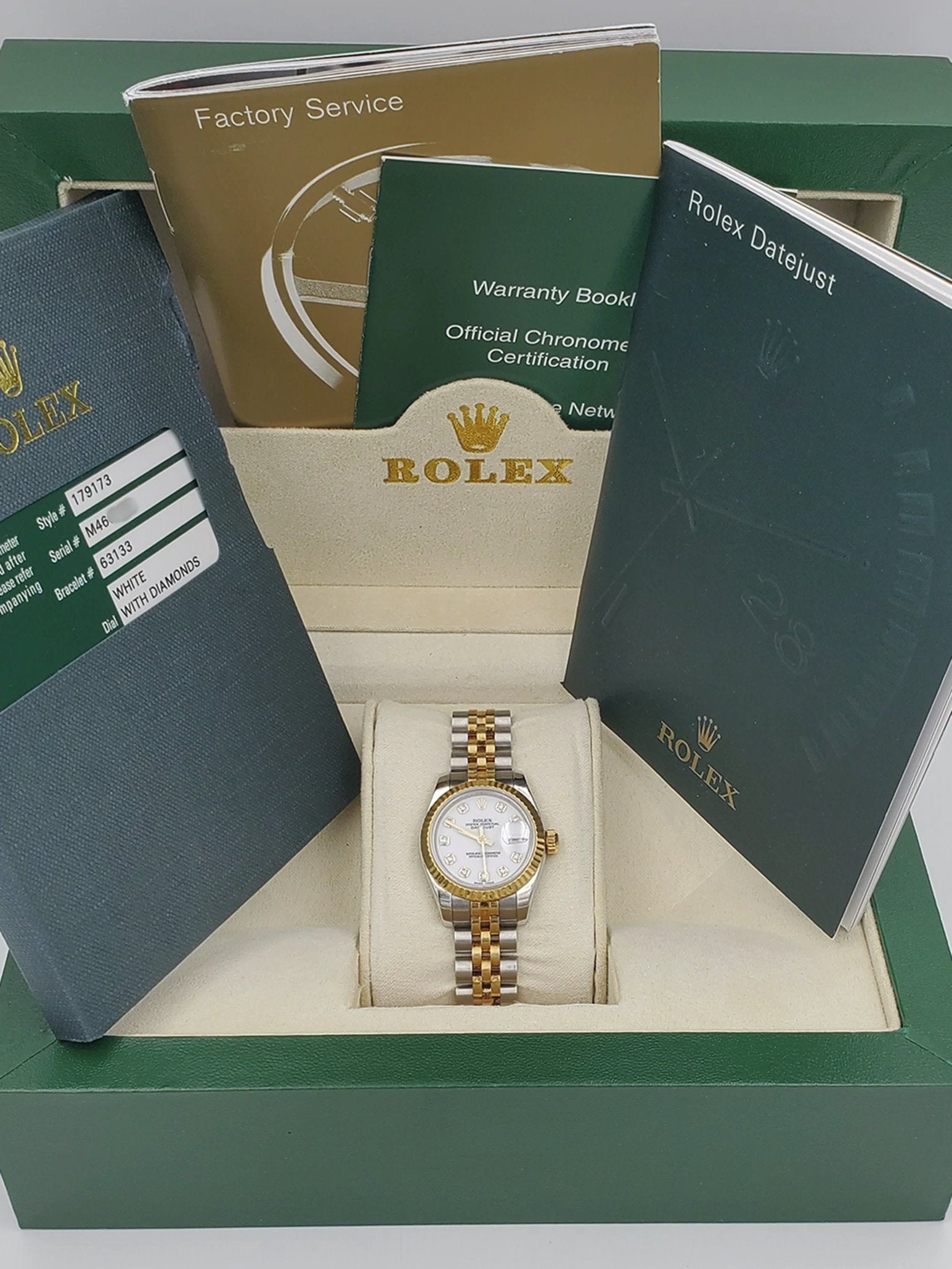 Ladies Rolex 26mm DateJust Two Tone Stainless Steel 18K Gold Watch with White Diamond Dial and Fluted Bezel. (Pre-Owned)