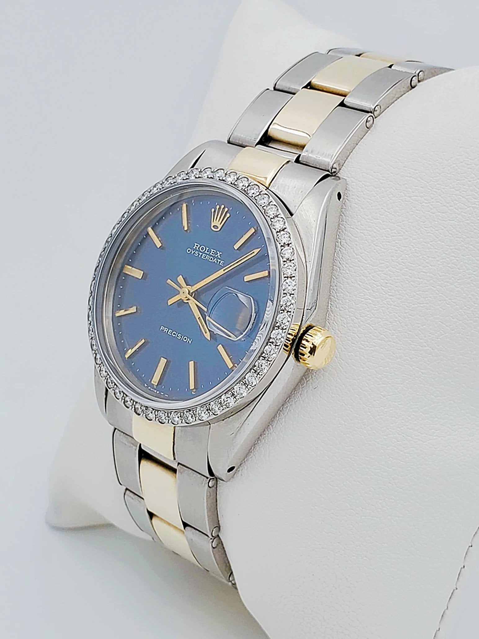 Unisex Rolex OysterDate 34mm Two Tone 14K Yellow Gold / Stainless Steel Watch with Blue Dial and Custom Diamond Bezel. (Pre-Owned 6694)