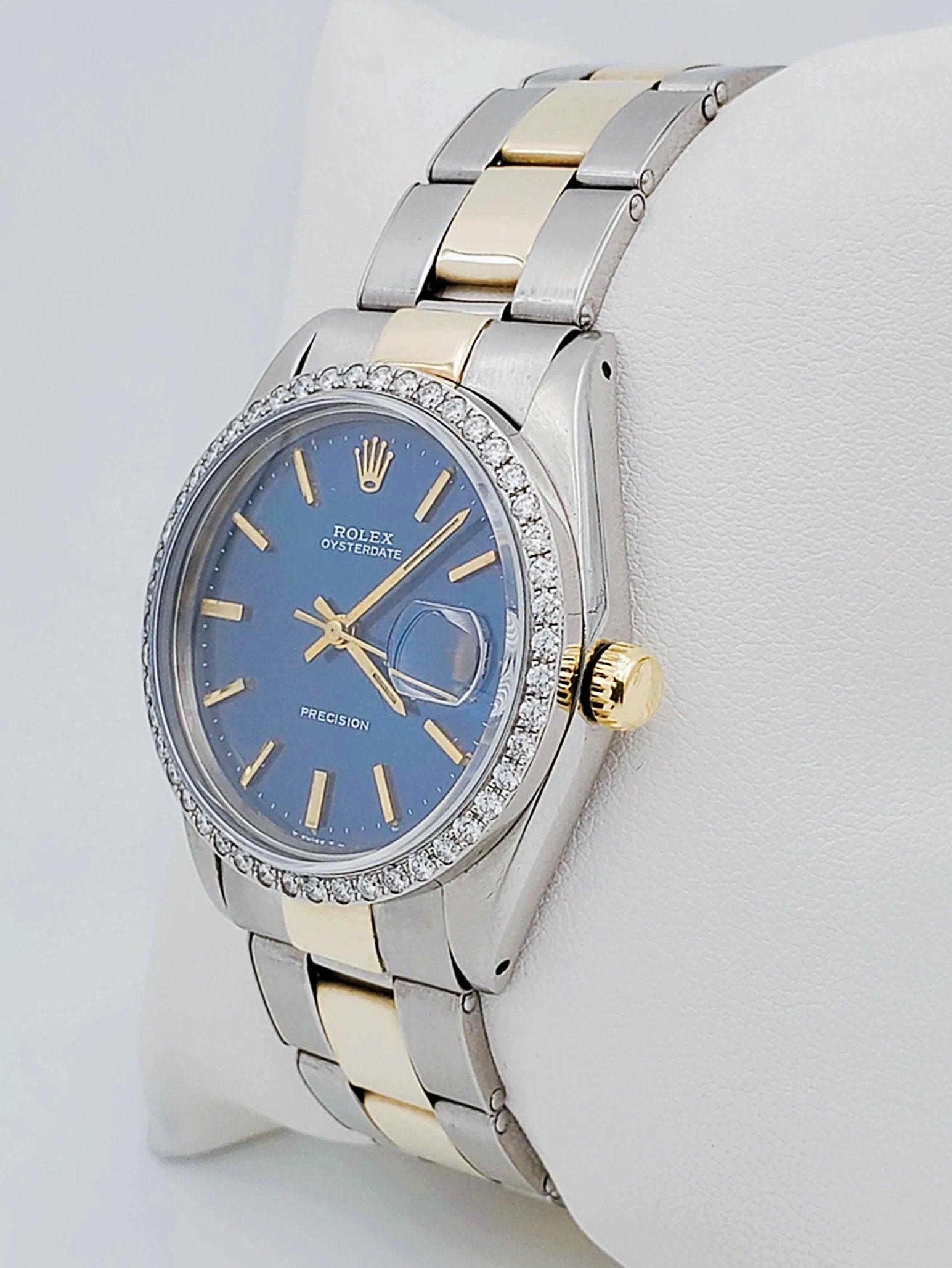 Unisex Rolex OysterDate 34mm Two Tone 14K Yellow Gold / Stainless Steel Watch with Blue Dial and Custom Diamond Bezel. (Pre-Owned 6694)