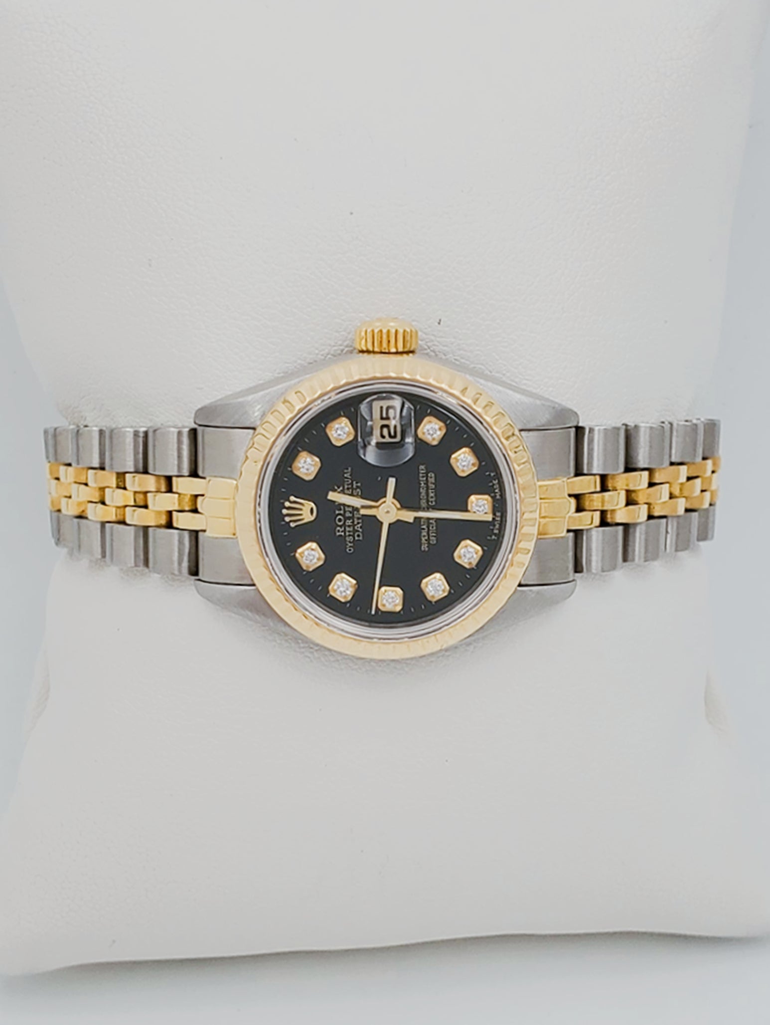 Ladies Rolex 26mm DateJust Two Tone 18K Gold / Stainless Steel Watch with Black Diamond Dial and Fluted Bezel. (Pre-Owned)