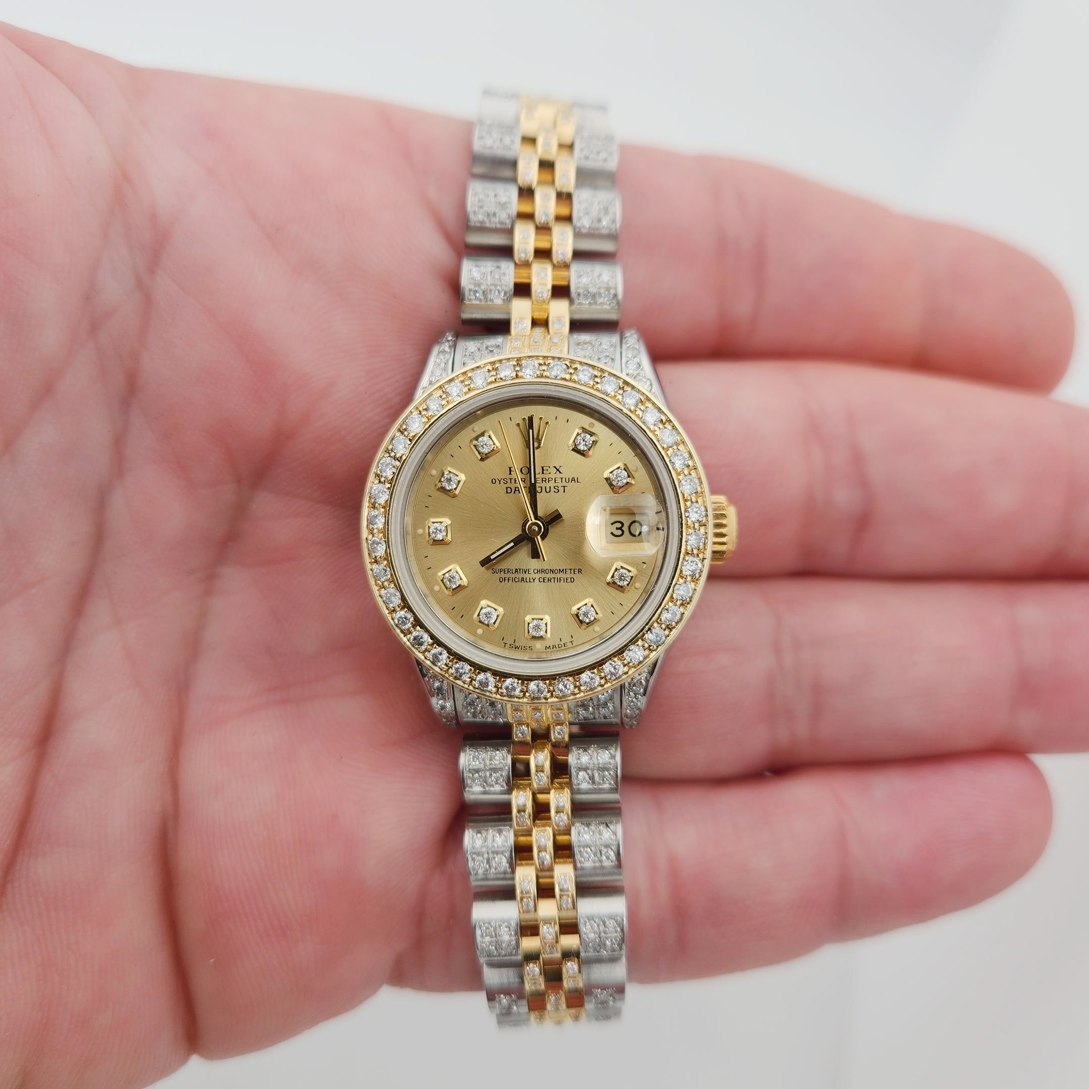 Ladies Rolex 26mm DateJust 18K Gold / Stainless Steel Watch with Diamond Band, Diamond Dial and Diamond Bezel. (Pre-Owned)