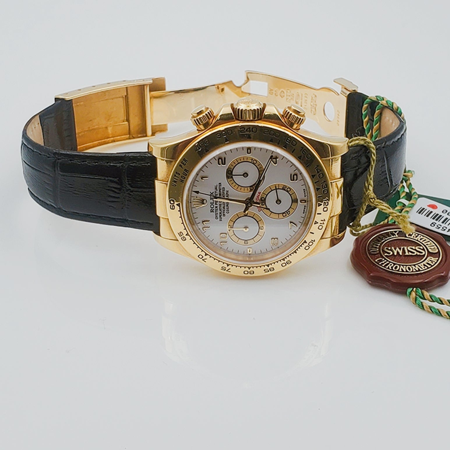 Men's Rolex 40mm Daytona 18K Yellow Gold Watch with Black Leather Strap and White Dial. (Pre-Owned 116518)