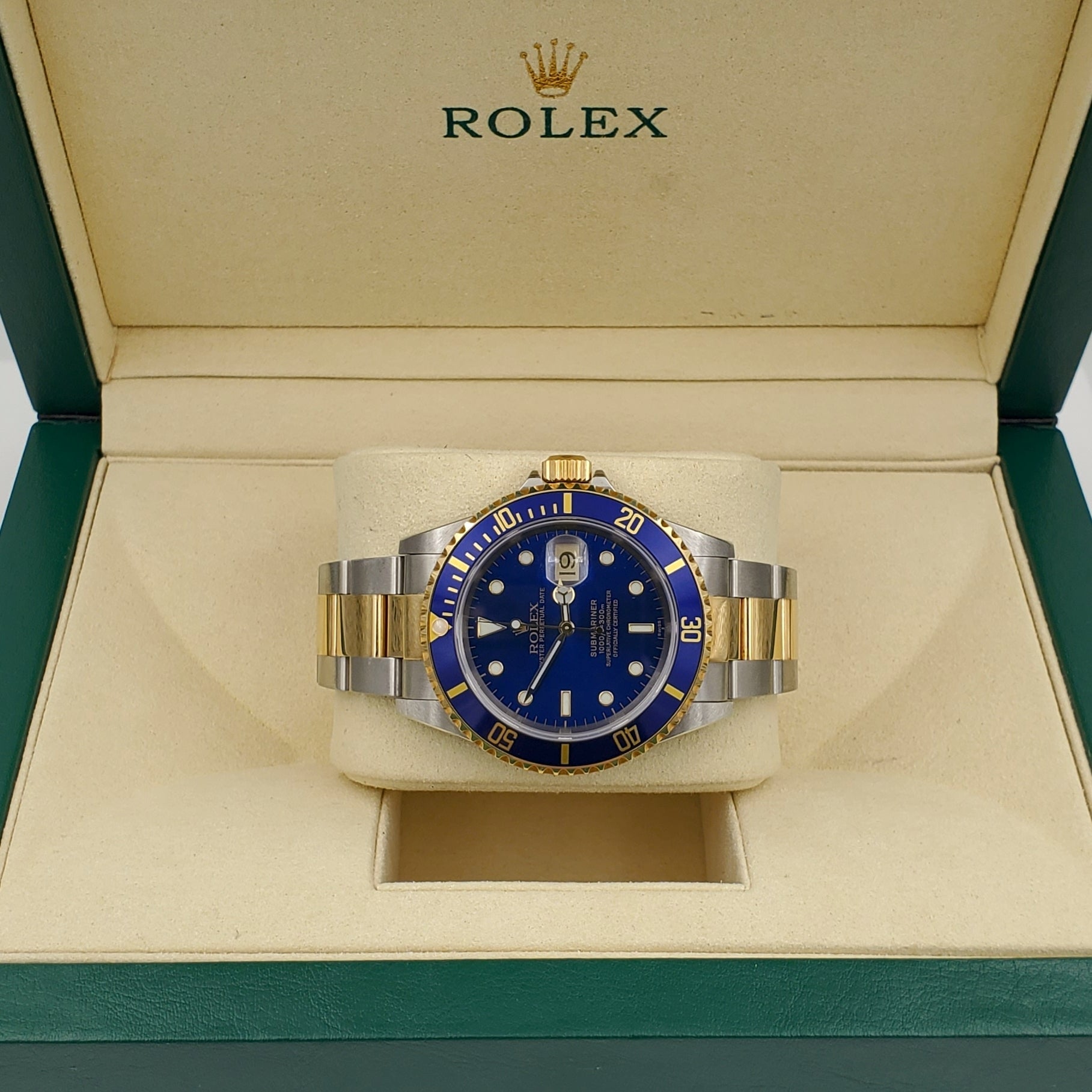 *1999 Men's Rolex 40mm Submariner Oyster Perpetual Two Tone 18K Yellow Gold / Stainless Steel Watch with Blue Dial and Blue Bezel. (Pre-Owned 16613)