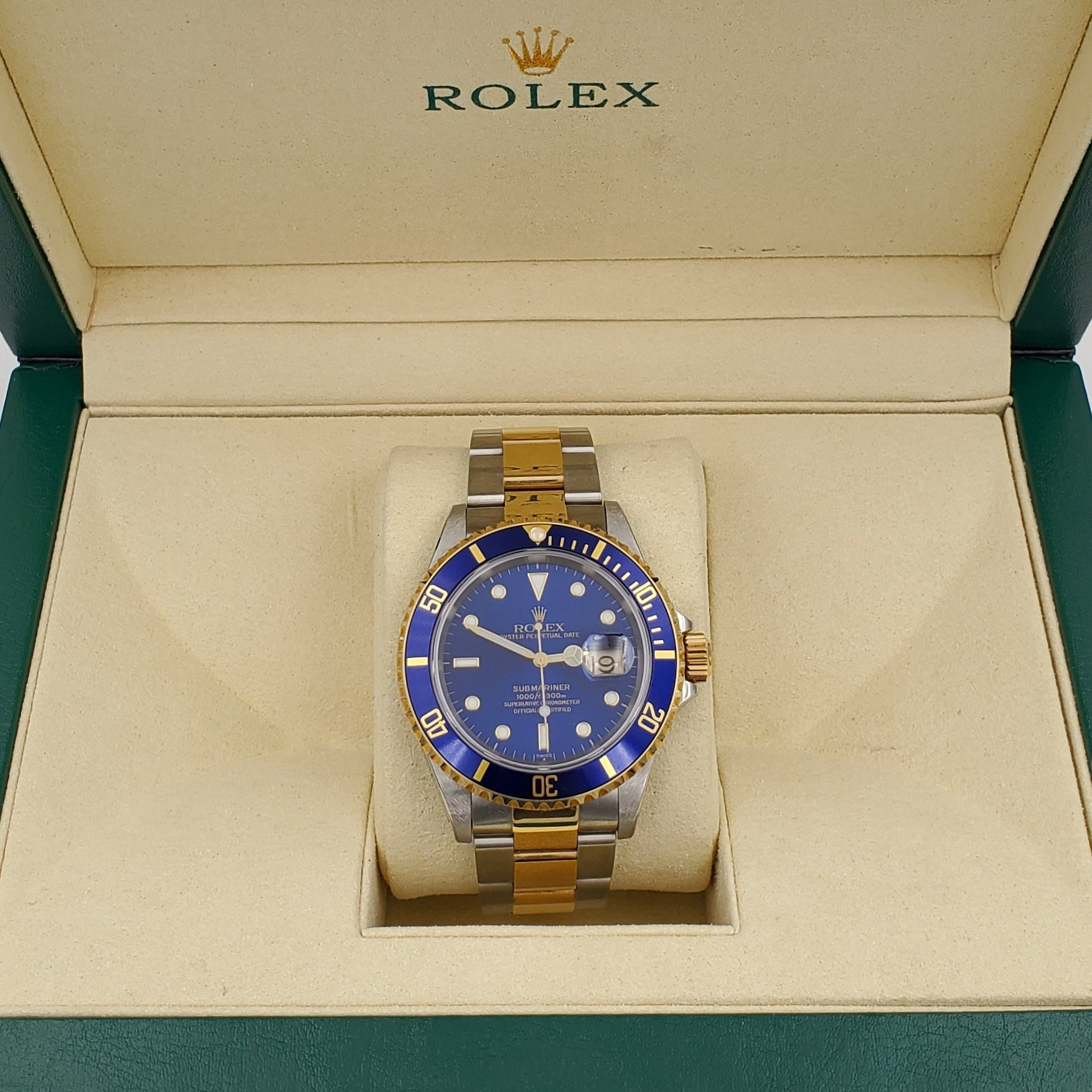 *1999 Men's Rolex 40mm Submariner Oyster Perpetual Two Tone 18K Yellow Gold / Stainless Steel Watch with Blue Dial and Blue Bezel. (Pre-Owned 16613)