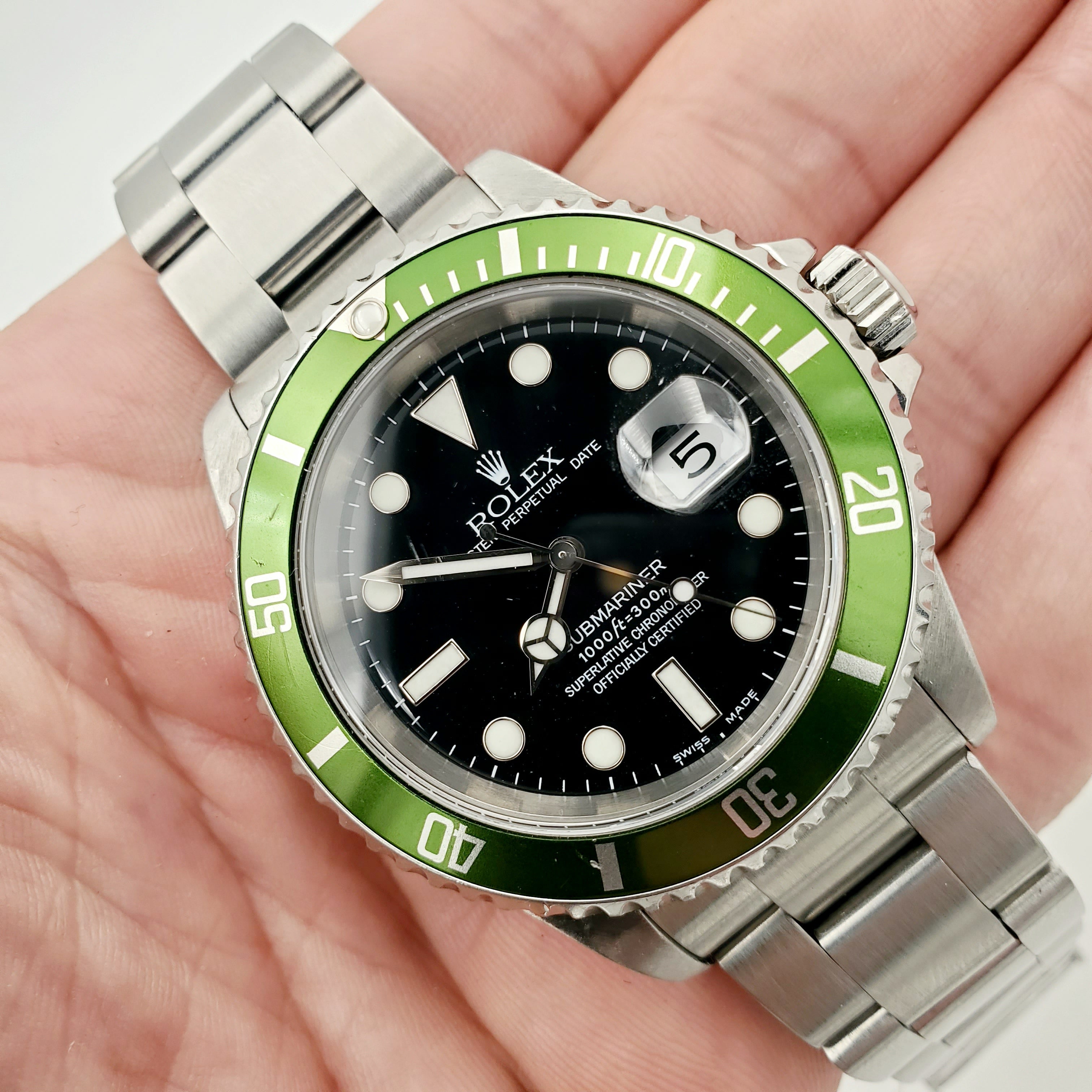 2003 Men's Rolex 40mm Submariner Oyster Perpetual Stainless Steel Watch with Black Dial and Green Bezel. (Pre-Owned 16610)