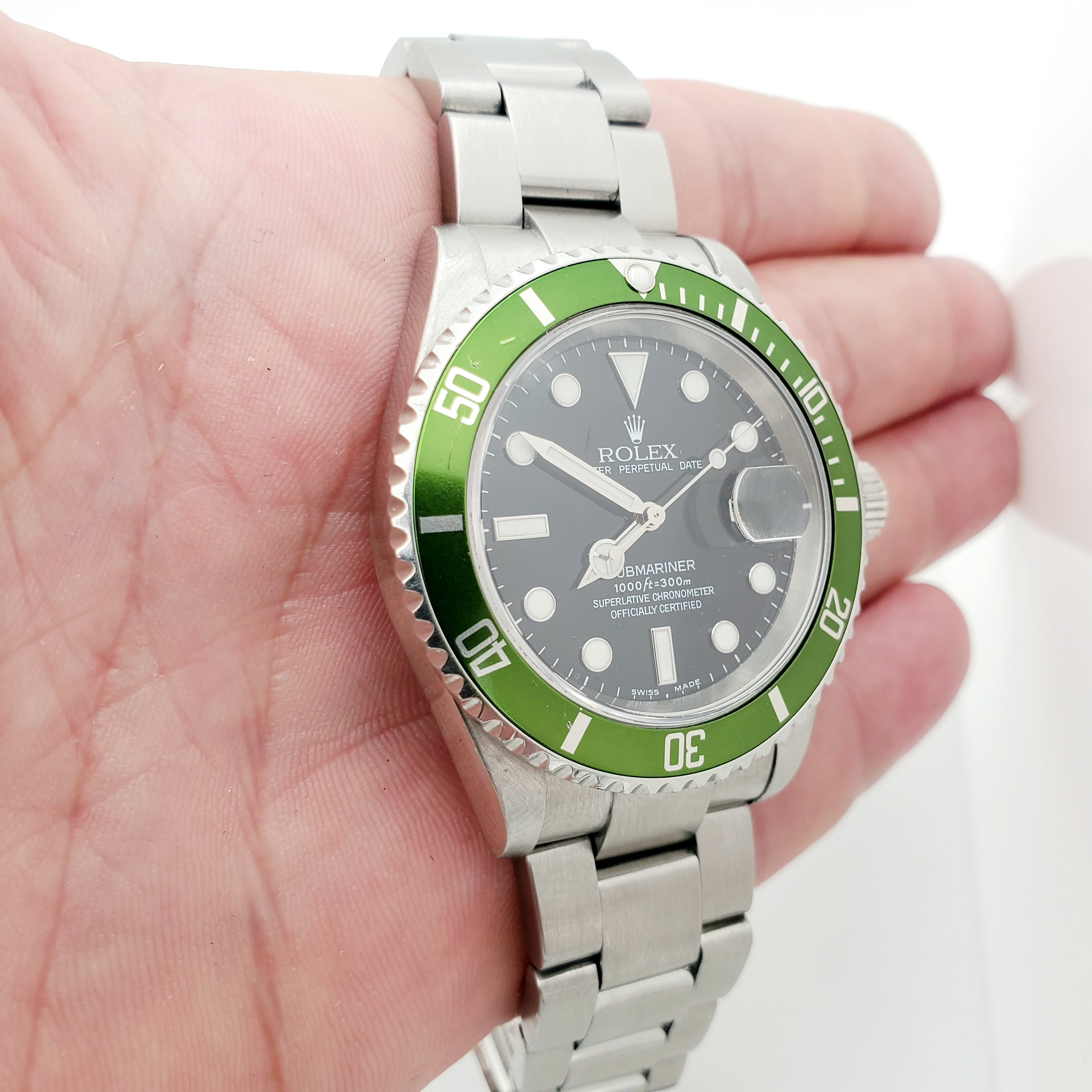 2003 Men's Rolex 40mm Submariner Oyster Perpetual Stainless Steel Watch with Black Dial and Green Bezel. (Pre-Owned 16610)