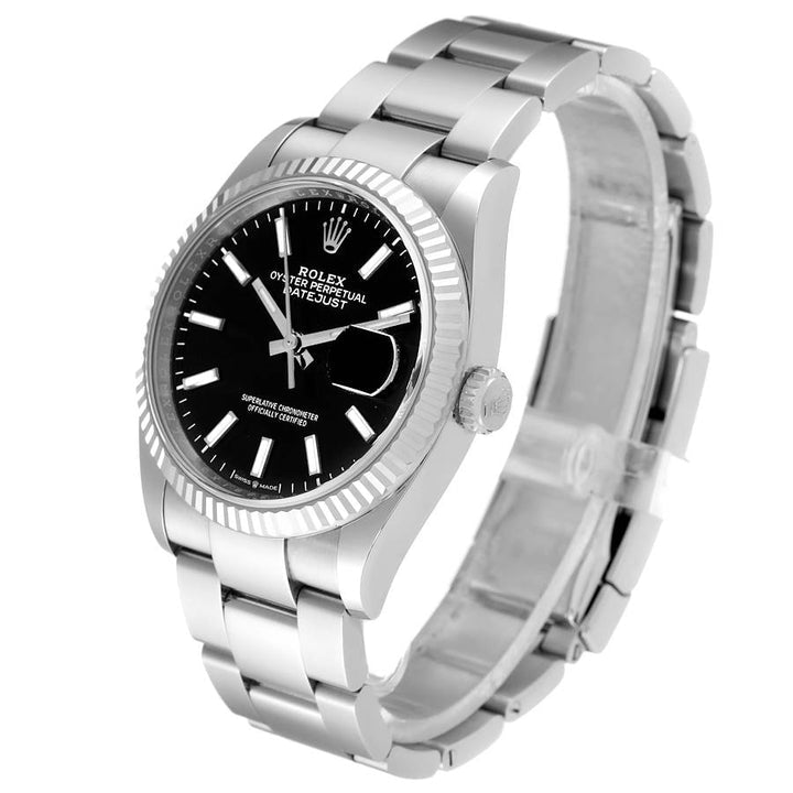 Ladies Midsize Rolex 31mm DateJust Stainless Steel Watch with Black Dial and Fluted Bezel. (Pre-Owned 17824C)