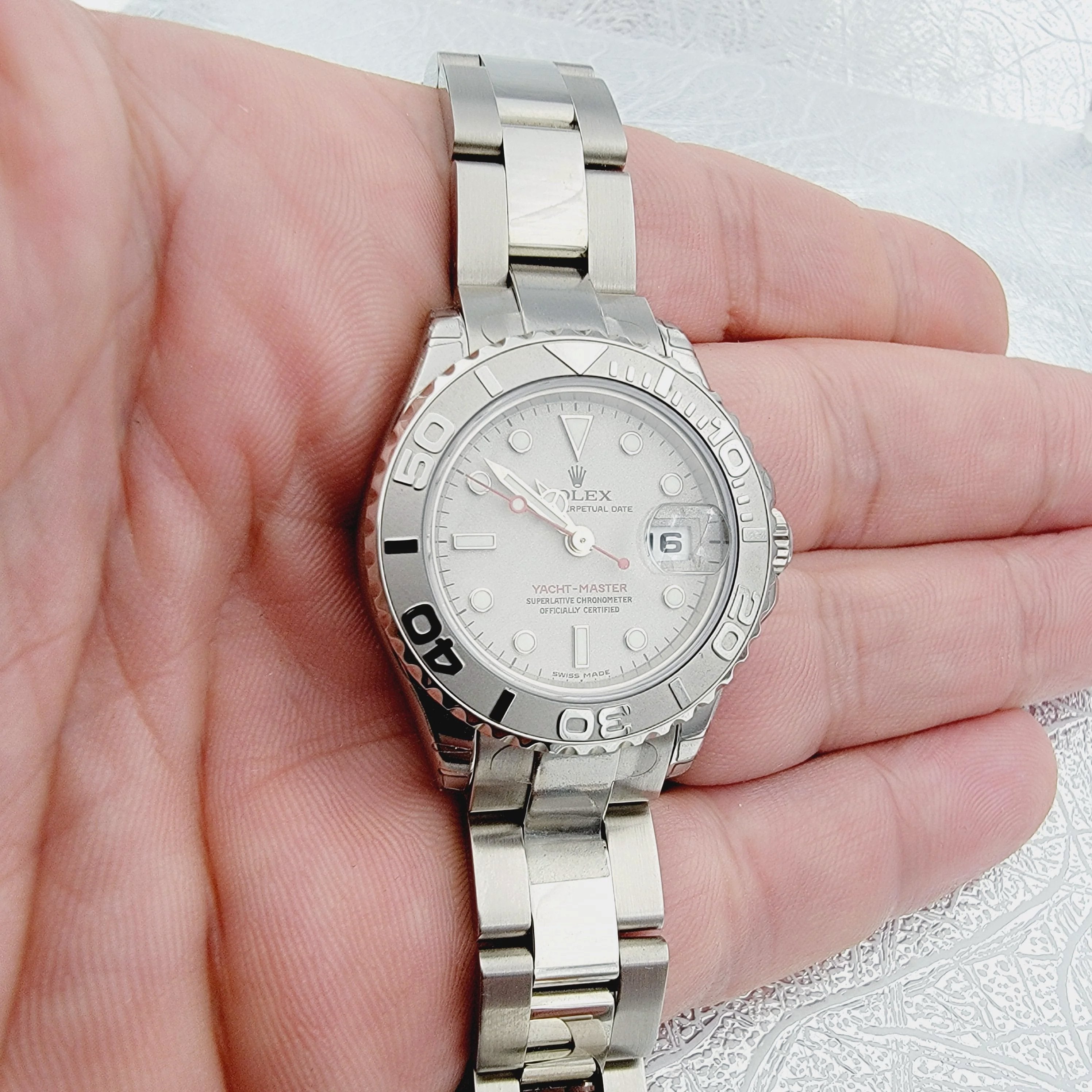 Ladies Rolex 29mm Yacht Master Stainless Steel Watch with Silver Dial and Rotatable Platinum Bezel. (UNWORN 169622)