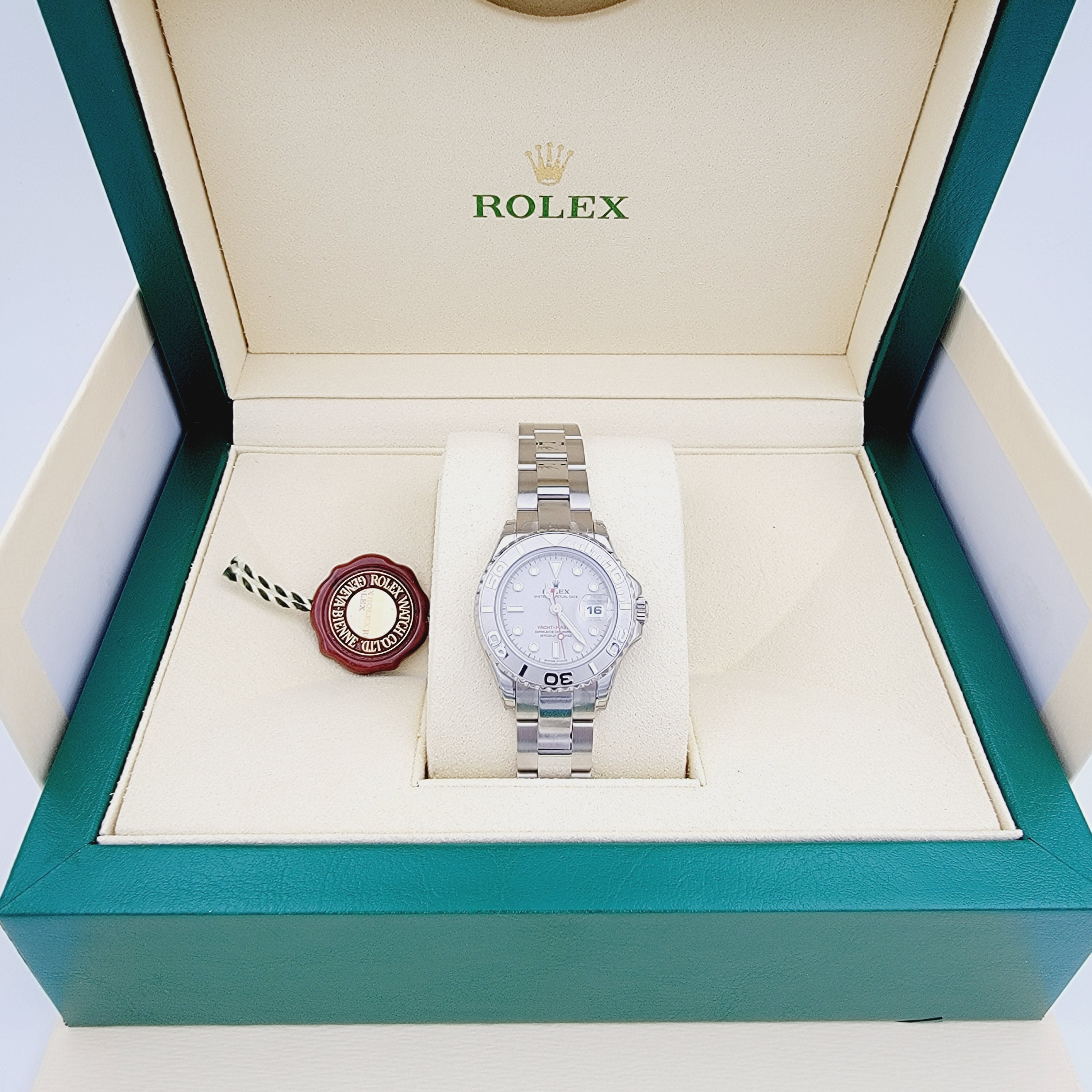 Ladies Rolex 29mm Yacht Master Stainless Steel Watch with Silver Dial and Rotatable Platinum Bezel. (UNWORN 169622)