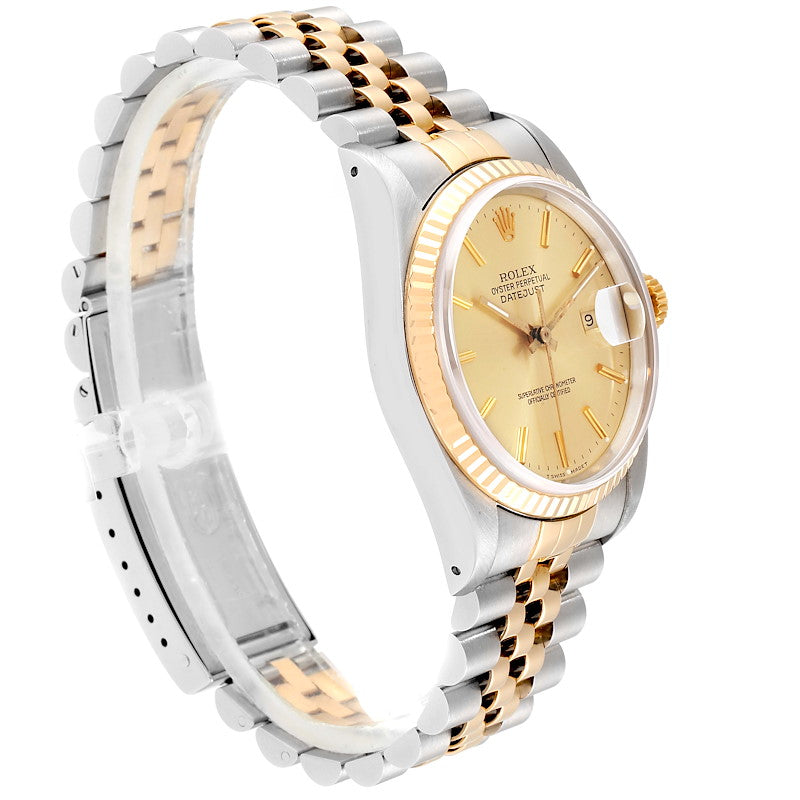 Ladies Rolex 26mm DateJust Two Tone 18K Gold Watch with Champagne Dial and 18k Fluted Bezel. (Pre-Owned)